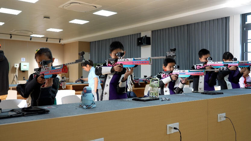5枚金牌！富阳这所小学藏不住了：从露天靶场到世界冠军(图2)
